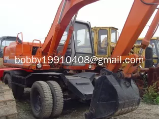 China EX100WD USED HITACHI WHEEL EXCAVATOR FOR SALE ORIGINAL JAPAN USED HITACHI EX100WD SALE supplier